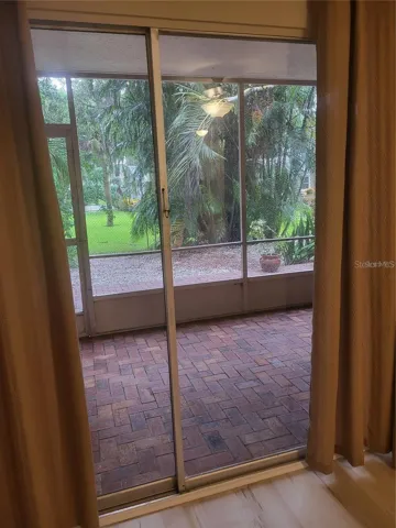 Screened-In Lanai Off Of The Living Room
