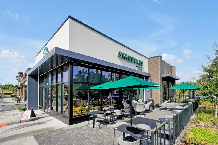 stores at entrance of community