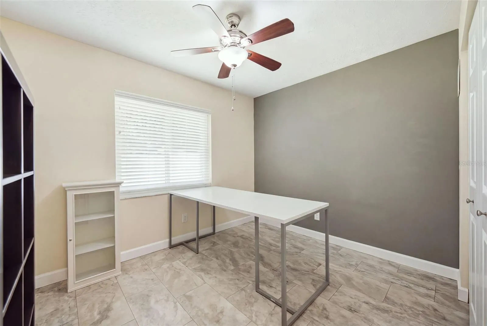 Second bedroom is being used as a home office