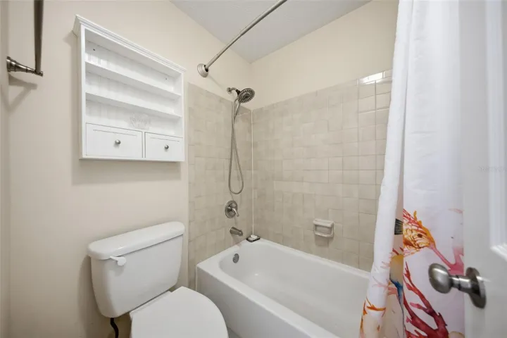 Primary shower &amp; toilet have a door for privacy