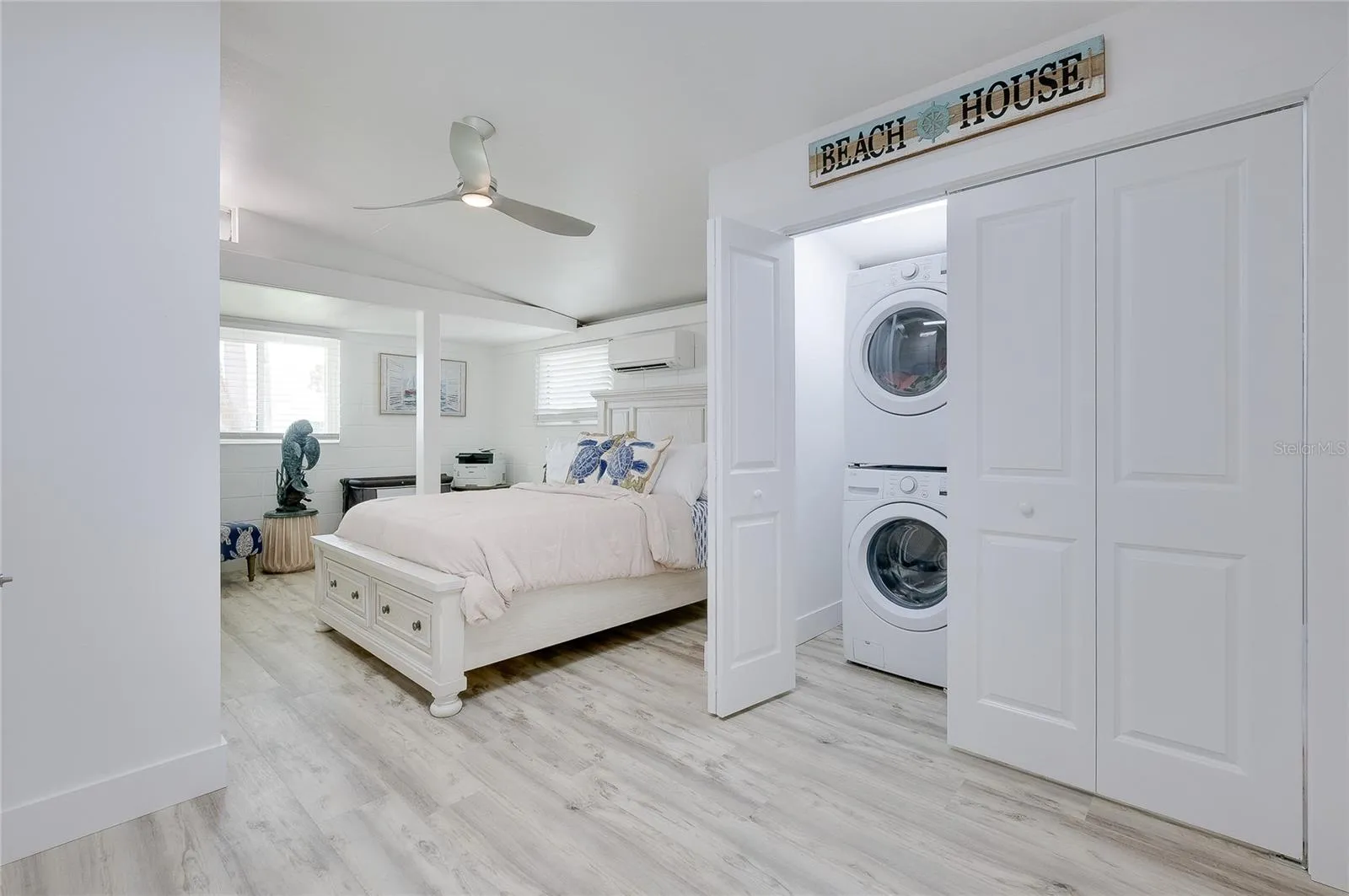 Laundry closet in third bedroom