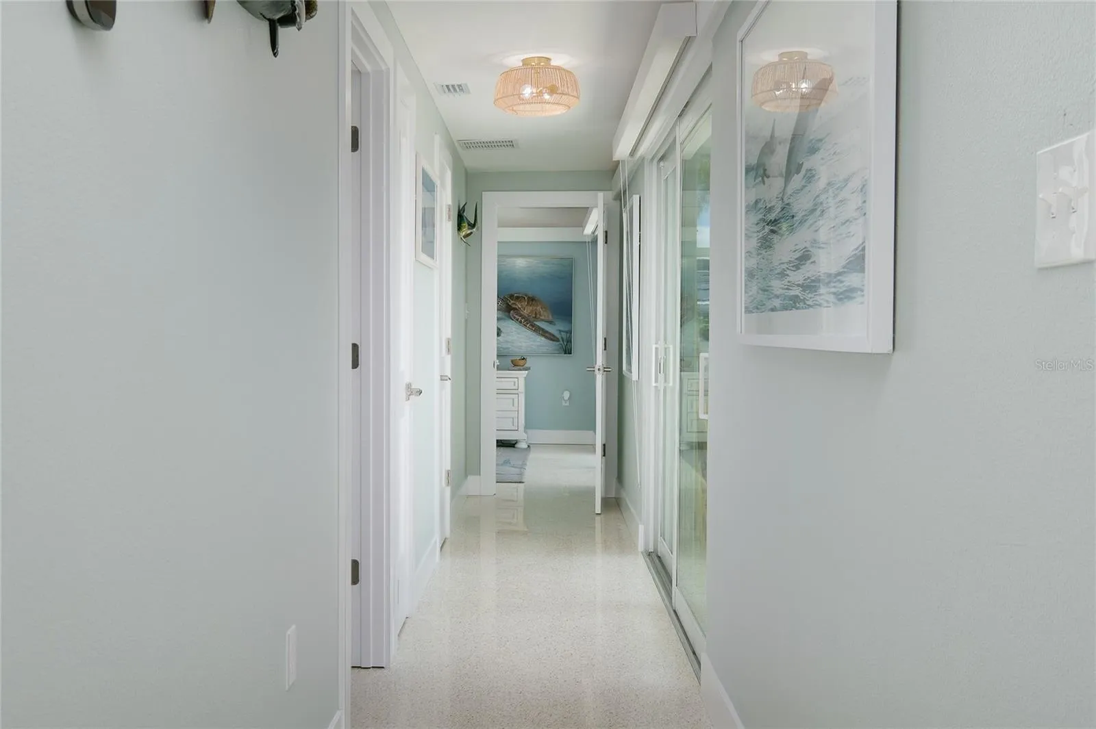 Hall with accent lighting at top of walls