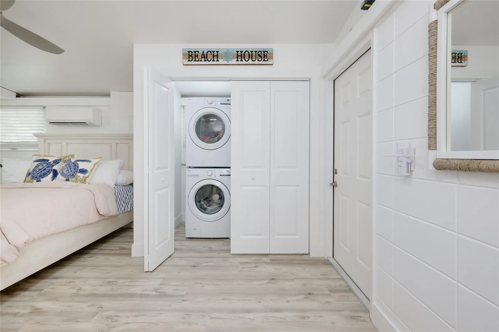 Laundry closet in third bedroom