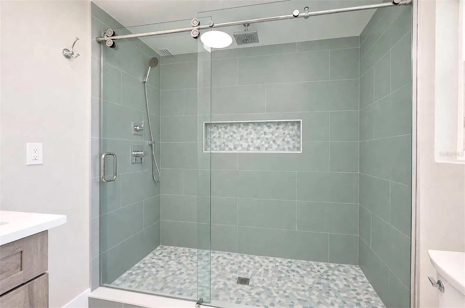 Primary bath large shower w/ rain shower head &amp; wand