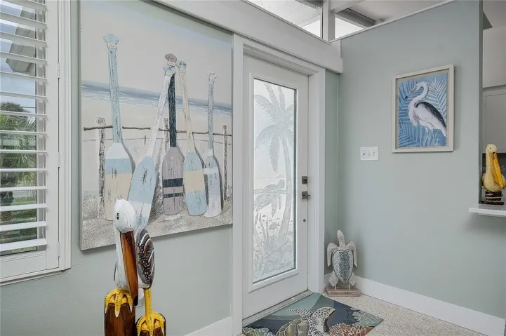 Inviting entry with etched glass door