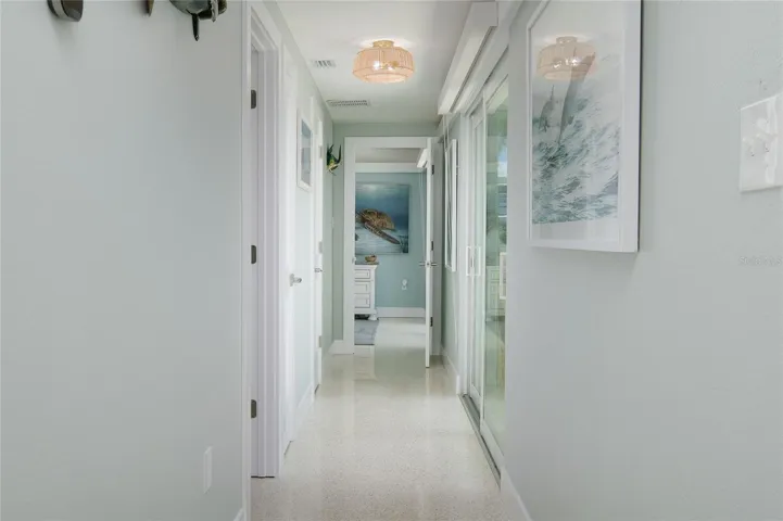 Hall with accent lighting at top of walls