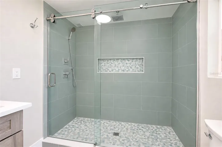 Primary bath large shower w/ rain shower head &amp; wand