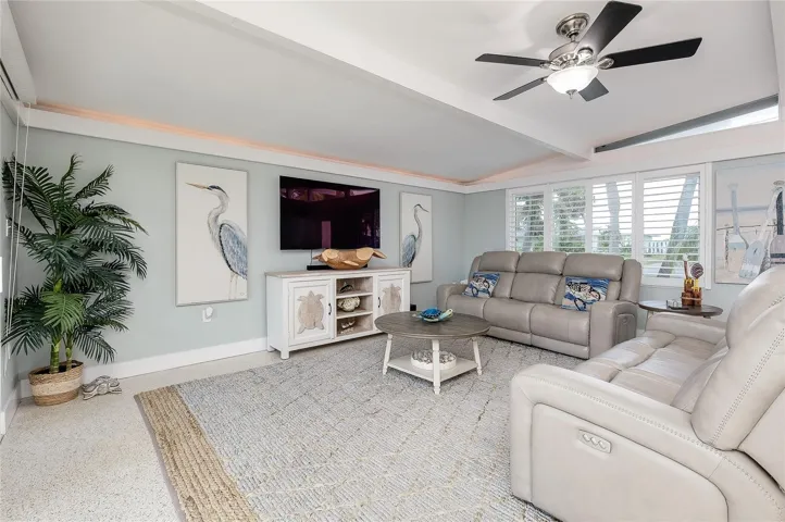 Warm lighting accents at top of wall