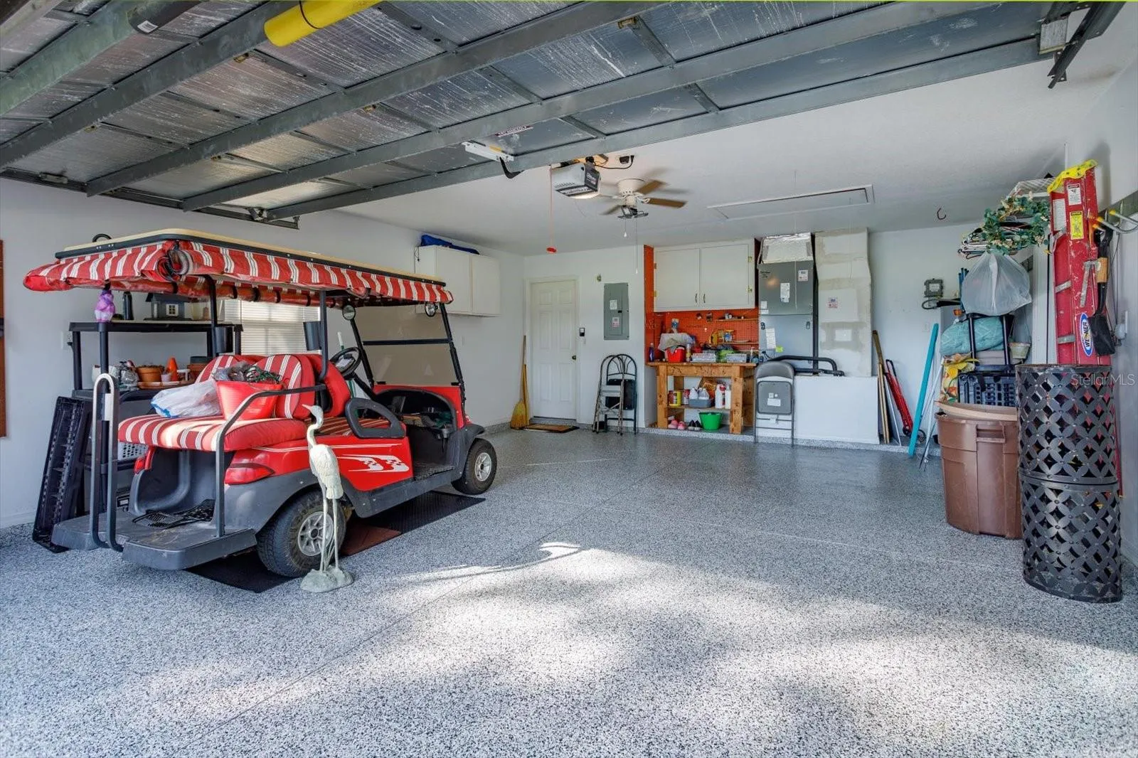New floor treatment in the garage is gorgeous