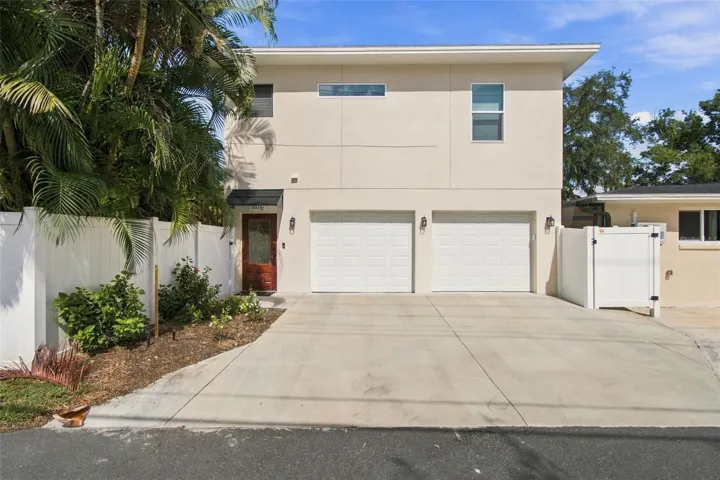 Parking Pad, Driveway, and Access to Garage