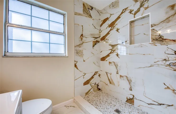 lovely  marble tiled shower
