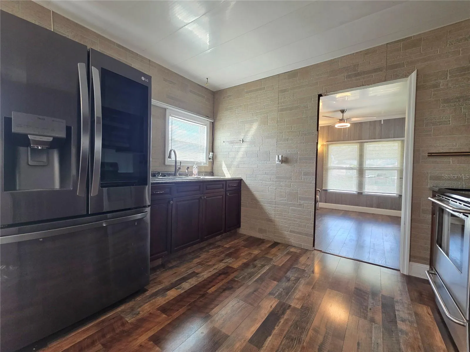 Kitchen with updated cabinetry and appliances.