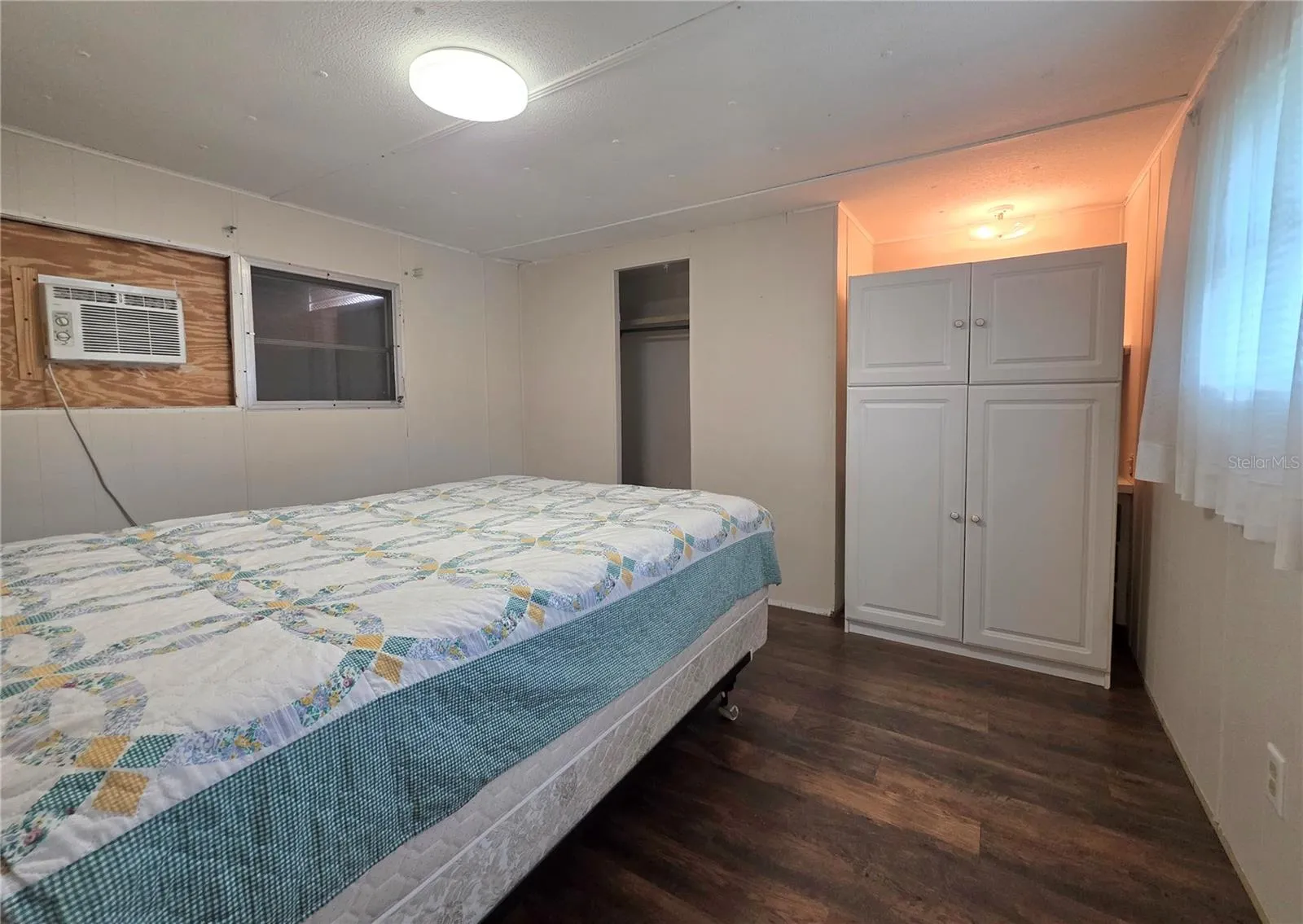 Bedroom with built-in features.