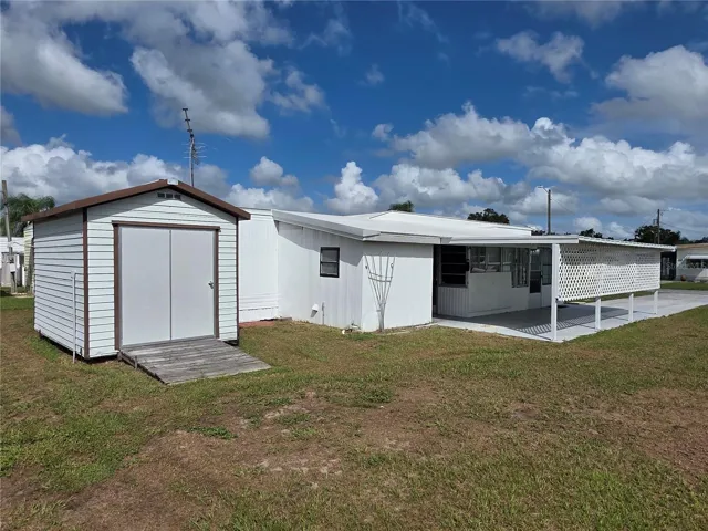 Free standing golfcart shed with ramp.