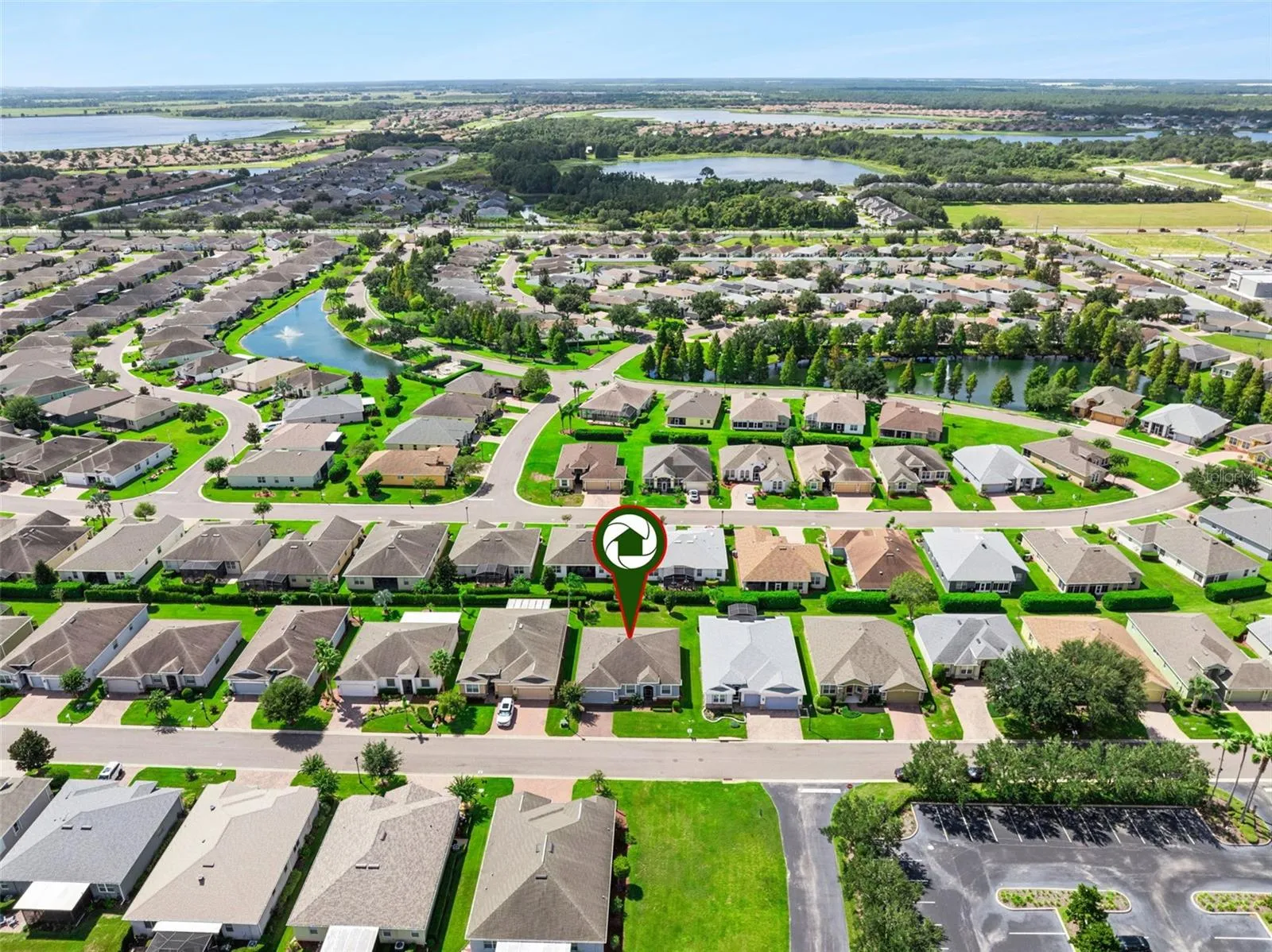 The monthly HOA fee includes lawn service, cable, internet, and exterior house painting, providing added value and making maintenance-free living truly effortless