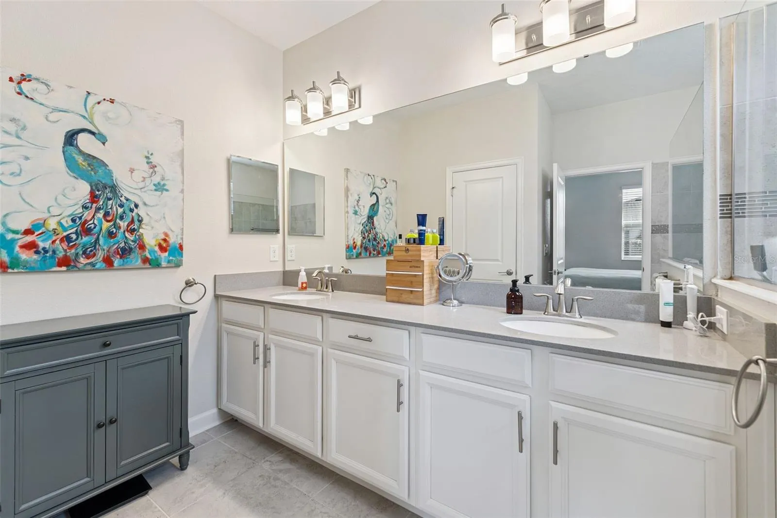 Primary Bathroom offers Comfort-Height Vanity with Dual Sinks, Quartz Counter Tops and A Water Closet