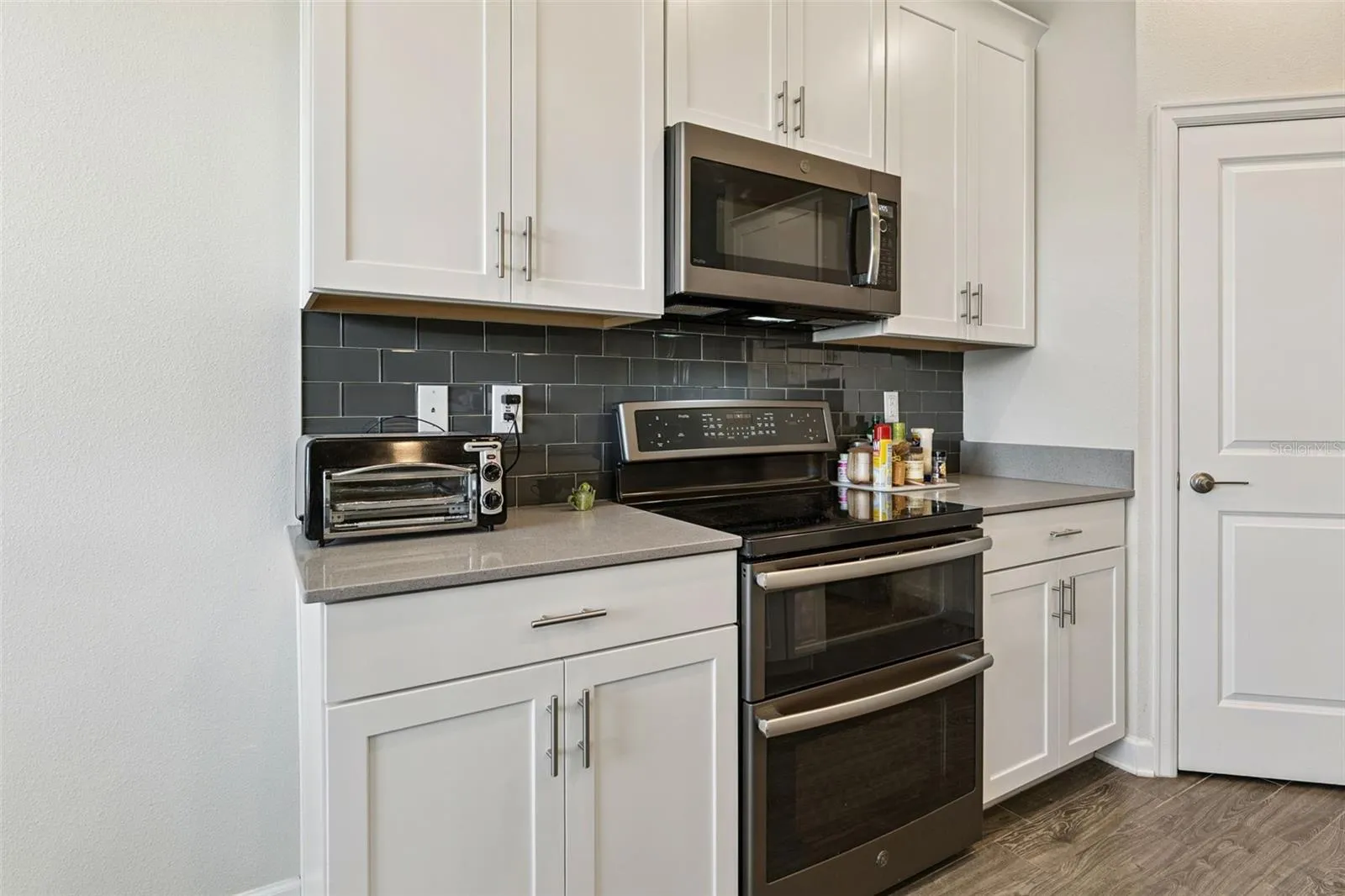 Glass Tile Backsplash and Closet Pantry
