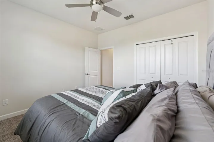 Wall to Wall Carpeting and an updated Celling Fan