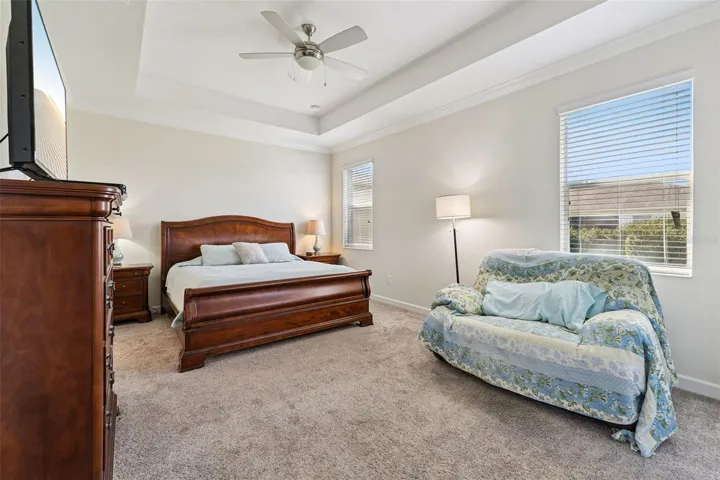 The Primary Bedroom Suite offers a peaceful retreat, featuring a tray ceiling
