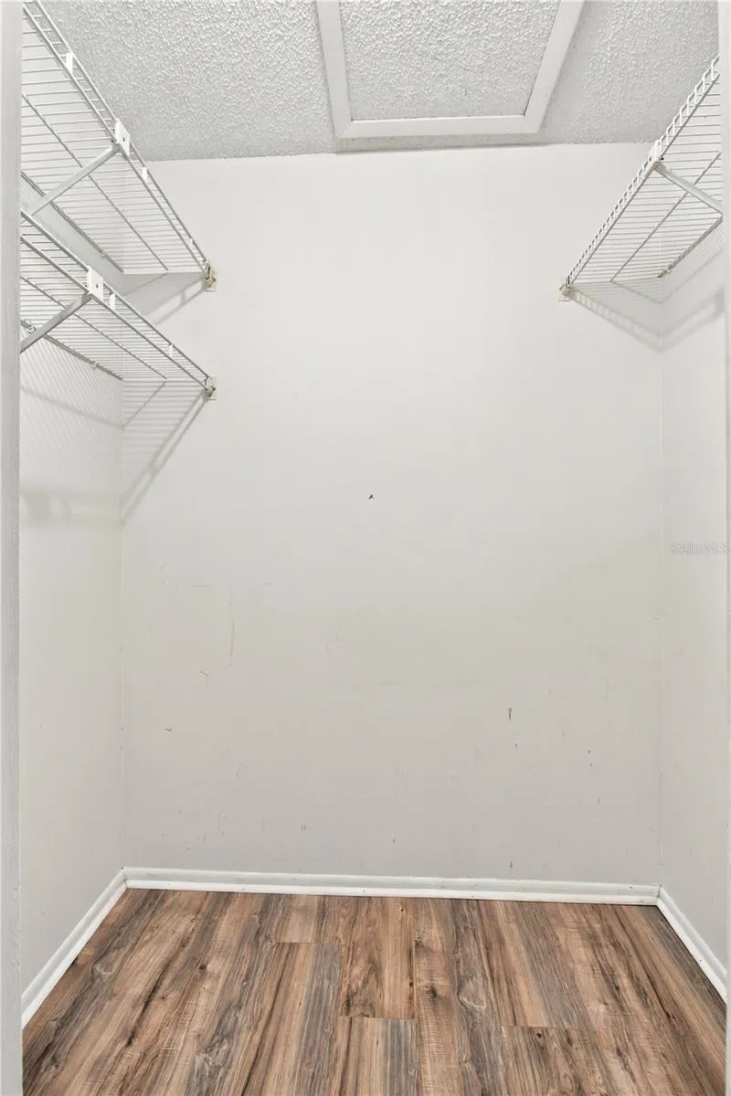 Primary bedroom walk-in closet provides plenty of space.