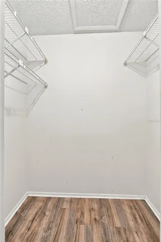 Primary bedroom walk-in closet provides plenty of space.