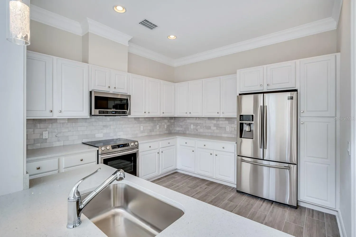 Updated kitchen with stainless steel appliances