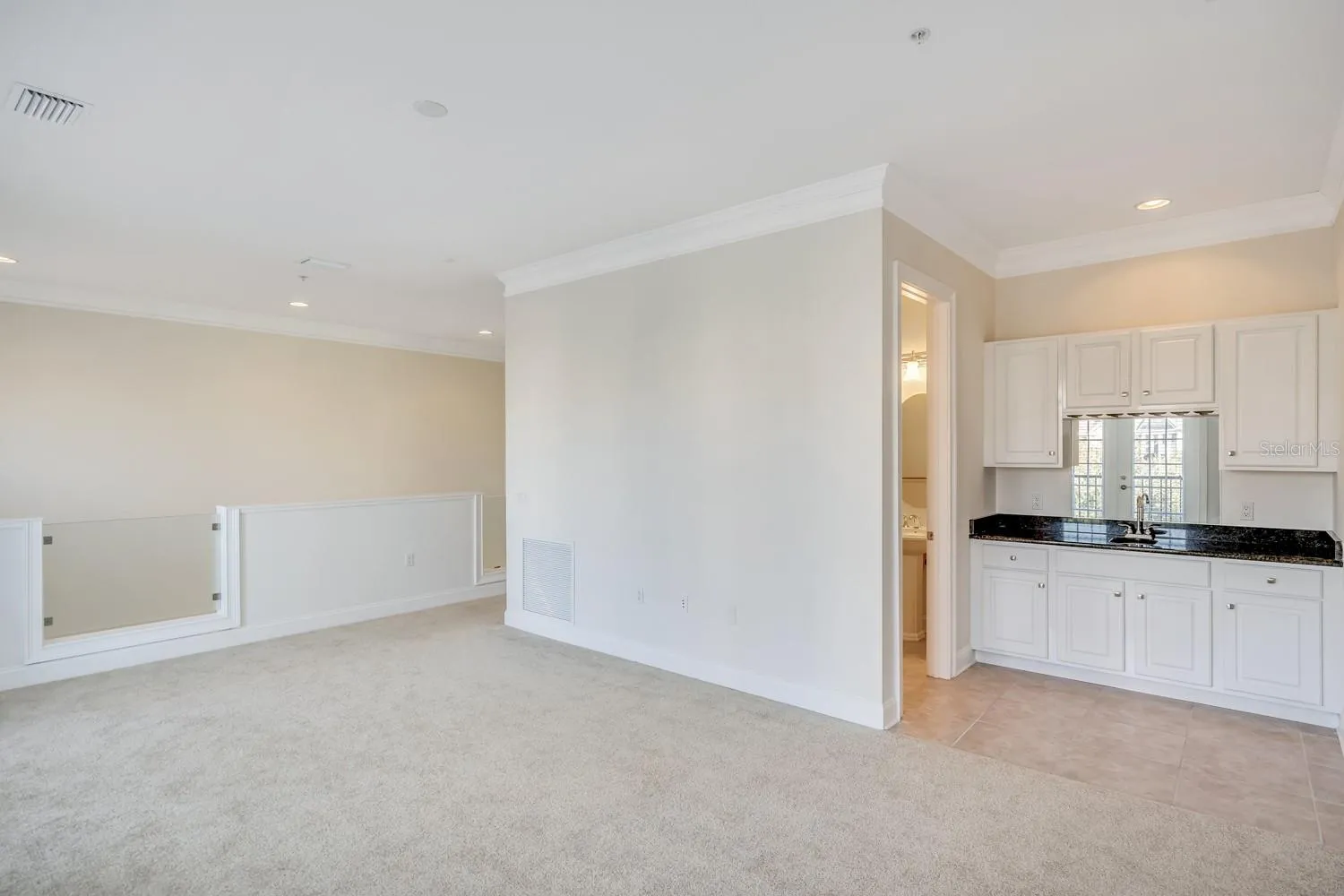 Spacious Loft-Style Flex Space with Wet Bar and Half Bath