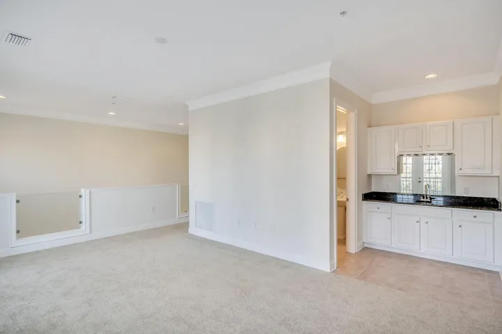 Spacious Loft-Style Flex Space with Wet Bar and Half Bath