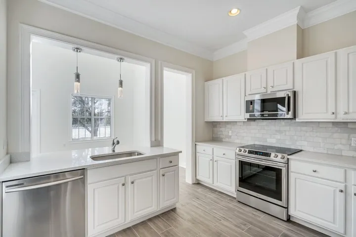Kitchen with pass-through Breakfast Bar