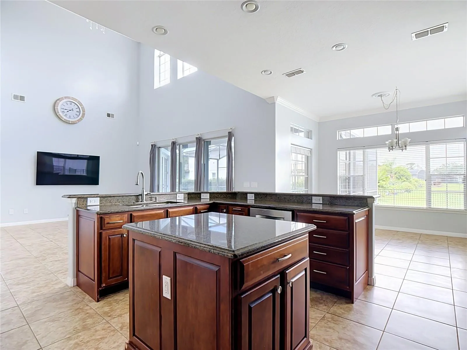 kitchen overlooking family room and kitchen eating area