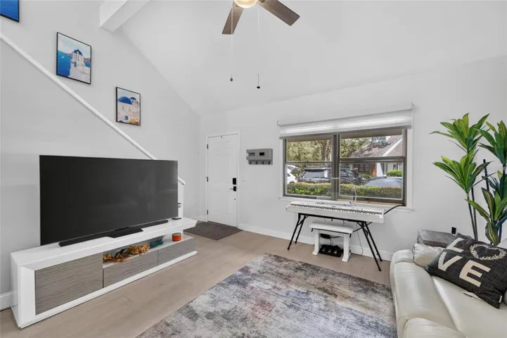 Movie night, anyone? A stylish living space that flows effortlessly into your beautiful kitchen.