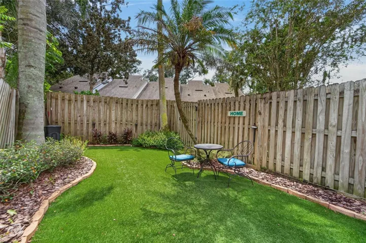Now that grass is green, but it's not grass....astroturf.  talk about maintenance free.