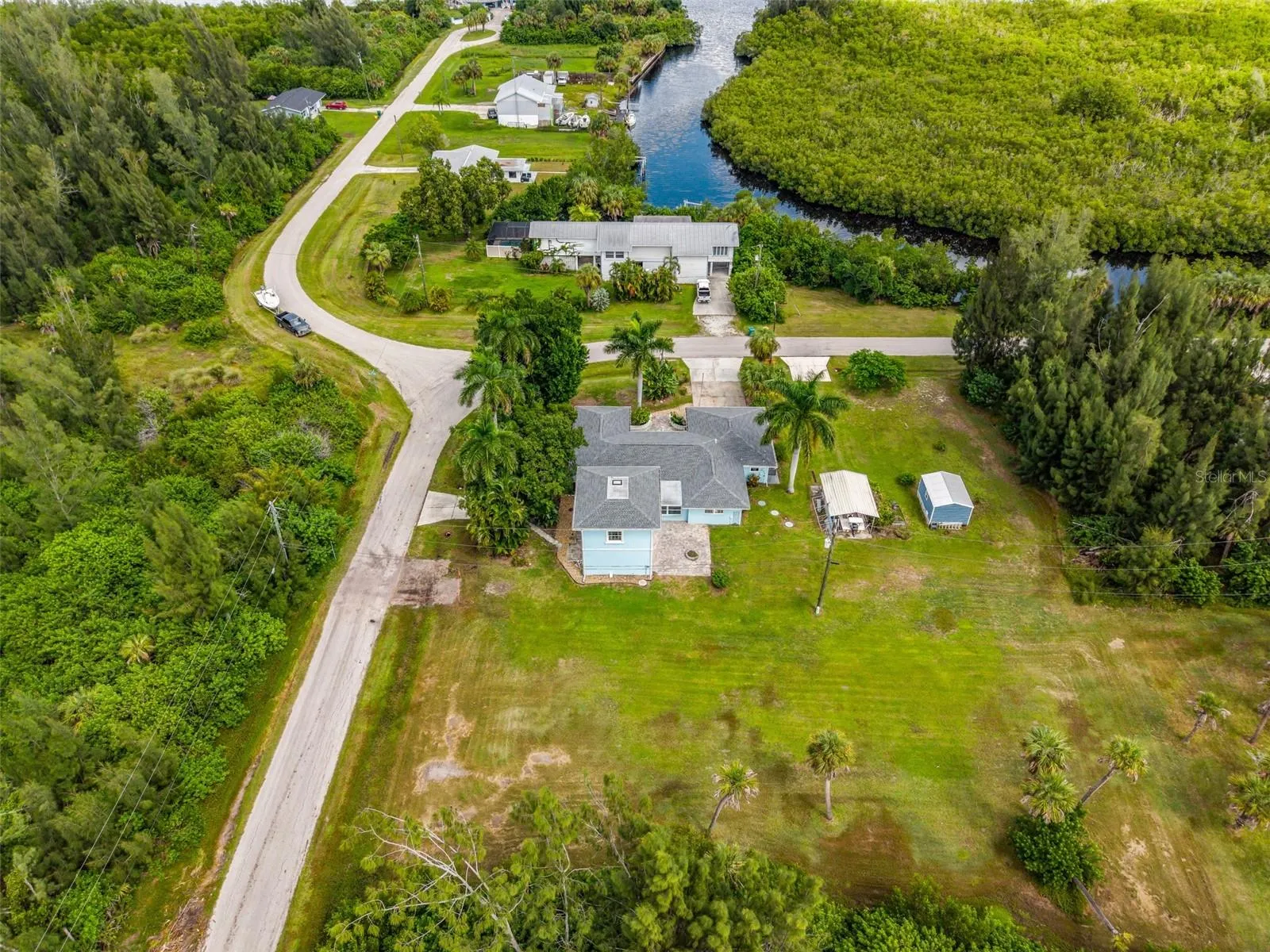 Aerial view of home and Peace River across the street