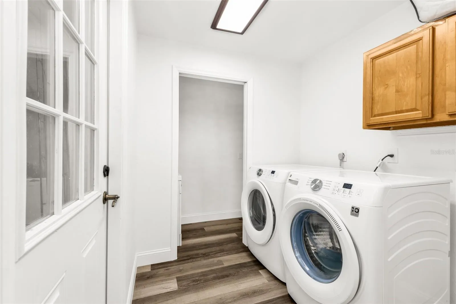 Laundry Room with access to garage and half bath