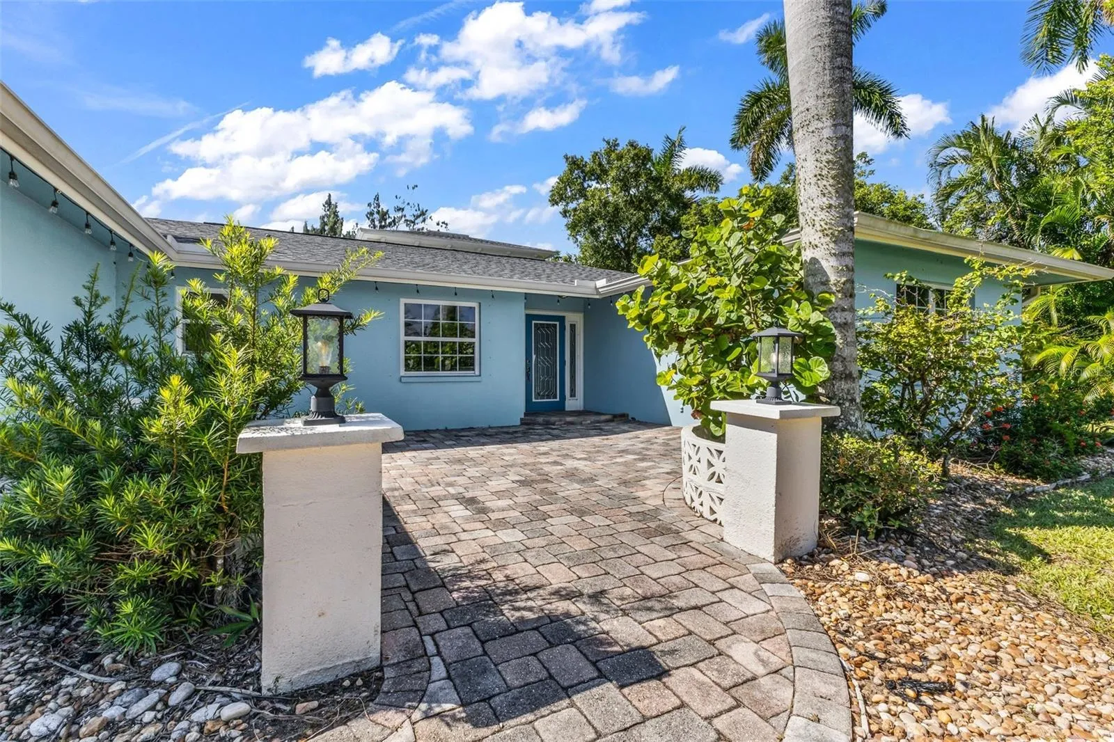 Decorative Pillars and pavers leading to home