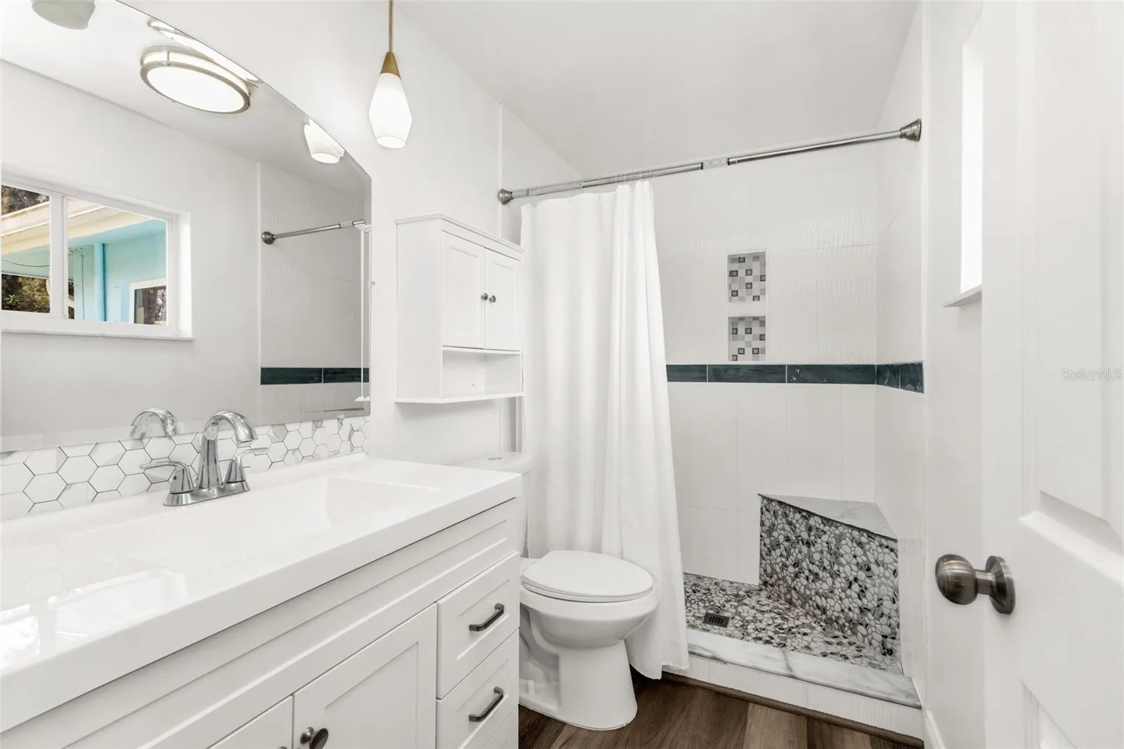 Primary Bathroom with updated tile shower