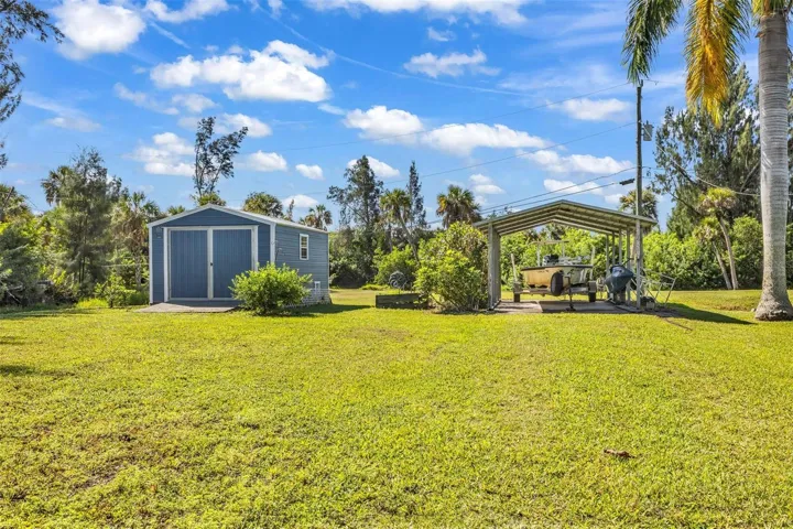 Shed and carport in side lot