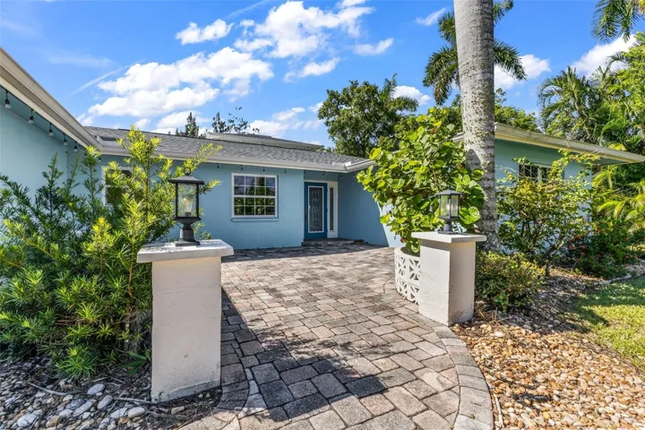 Decorative Pillars and pavers leading to home