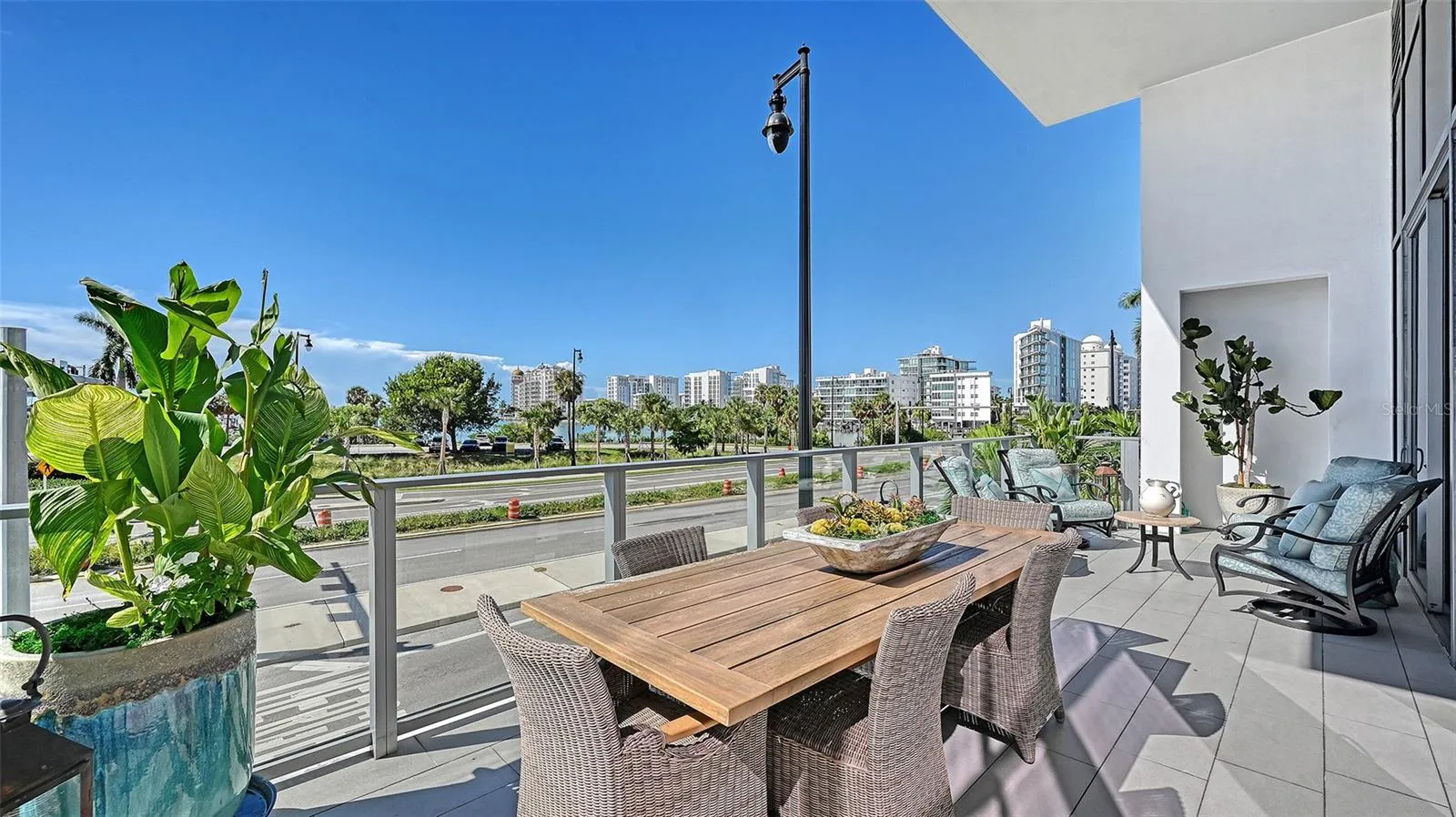 Enjoy elegant outdoor entertaining on the expansive private terrace, perfect for al fresco dining while taking in the beautiful marina views and passing boats.