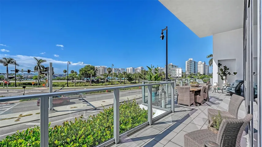 The inviting seating area offers the perfect setting to relax and enjoy Sarasota Bay.