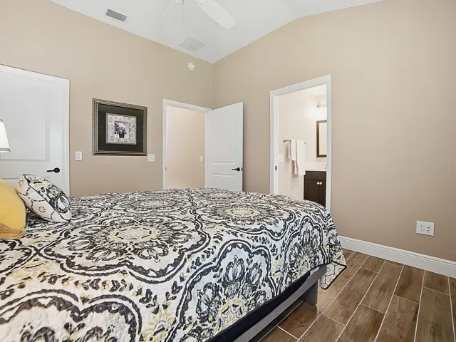 THIS GUEST ROOM HAS A LARGE DEEP CLOSET AND AN EN-SUITE BATH.