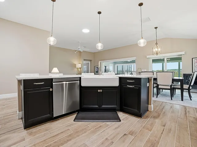 FARMHOUSE SINK!  PENDANTS OVER THE BREAKFAST BAR!