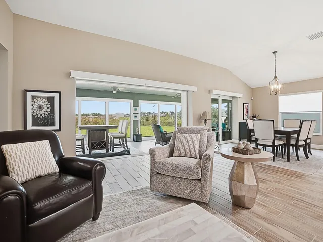 STACKBACK DOORS OFF OF THE LIVING ROOM FOR A WIDE OPEN VIEW!
