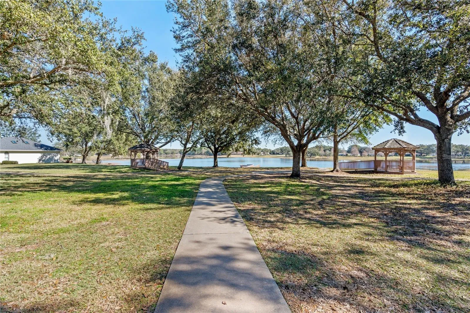 The GAZEBOS AT ROYAL LAKE are a popular gathering spot for residents.