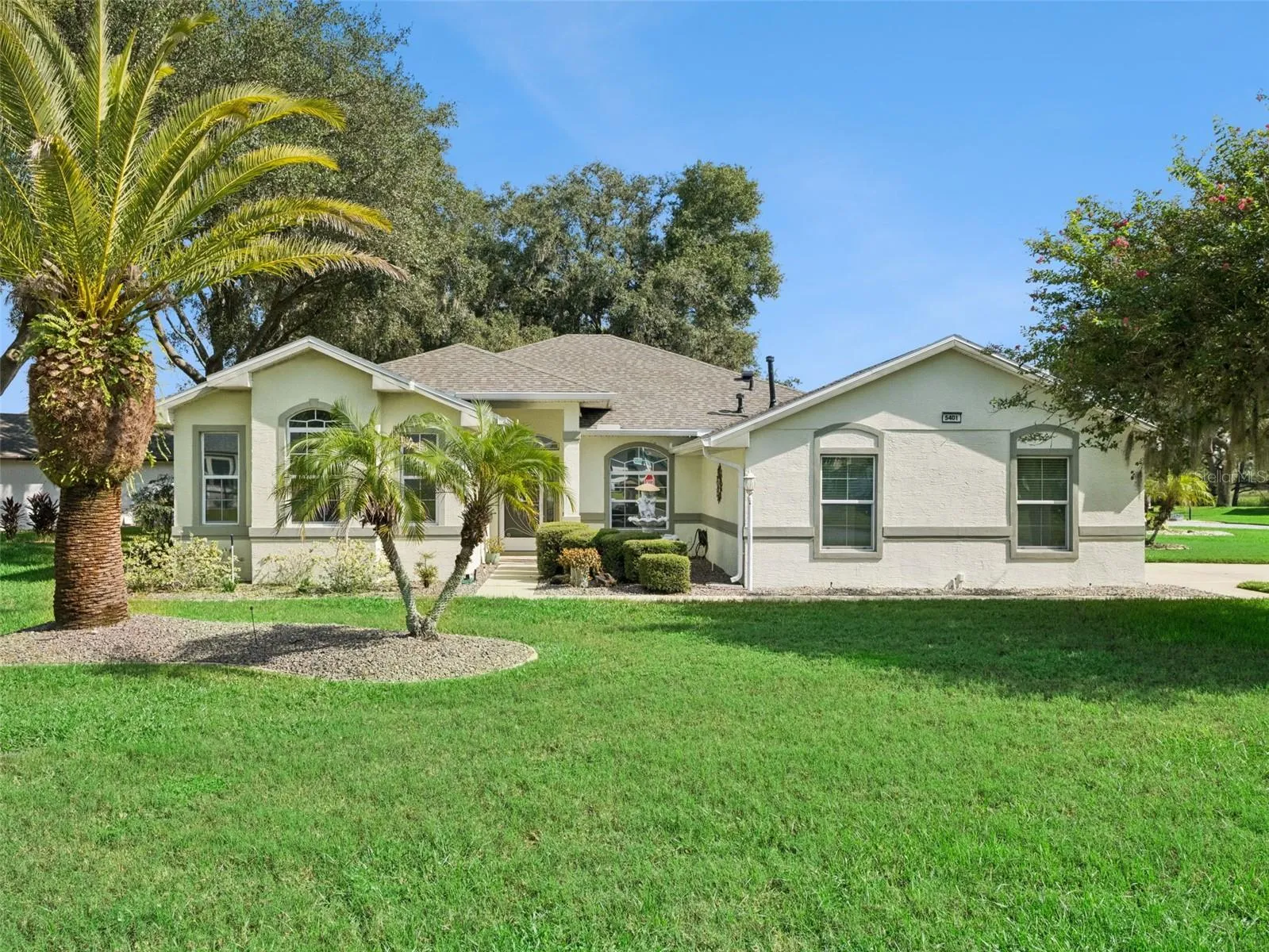 This home is situated on a large 1/4 ACRE + LOT on a quiet CUL-DE-SAC.