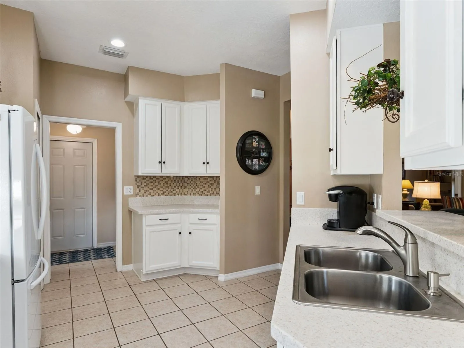 The Kitchen appliances are newer and the refrigerator is only a year old.