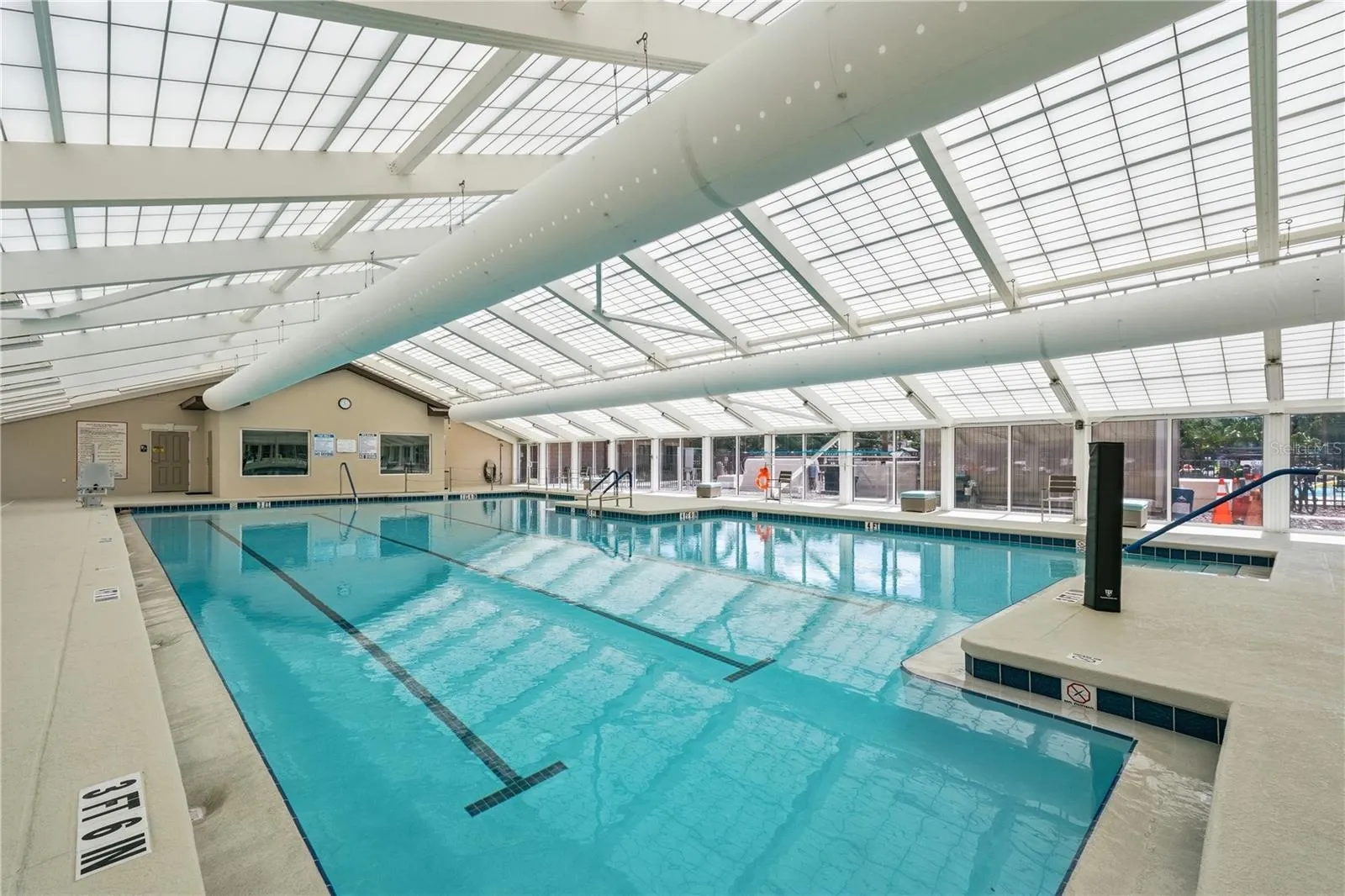The newly-replaced INDOOR POOL where residents and their guests can SWIM YEAR 'ROUND in the HEATED pool.