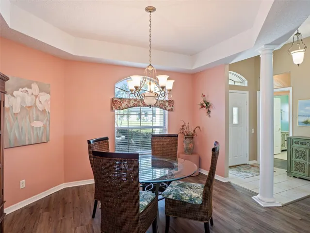 The Dining Area has a lovely tray ceiling and is warm & inviting.