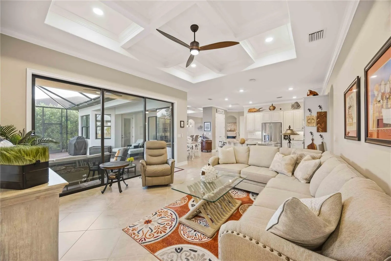 The sliding doors open to the great room and bring abundant light.