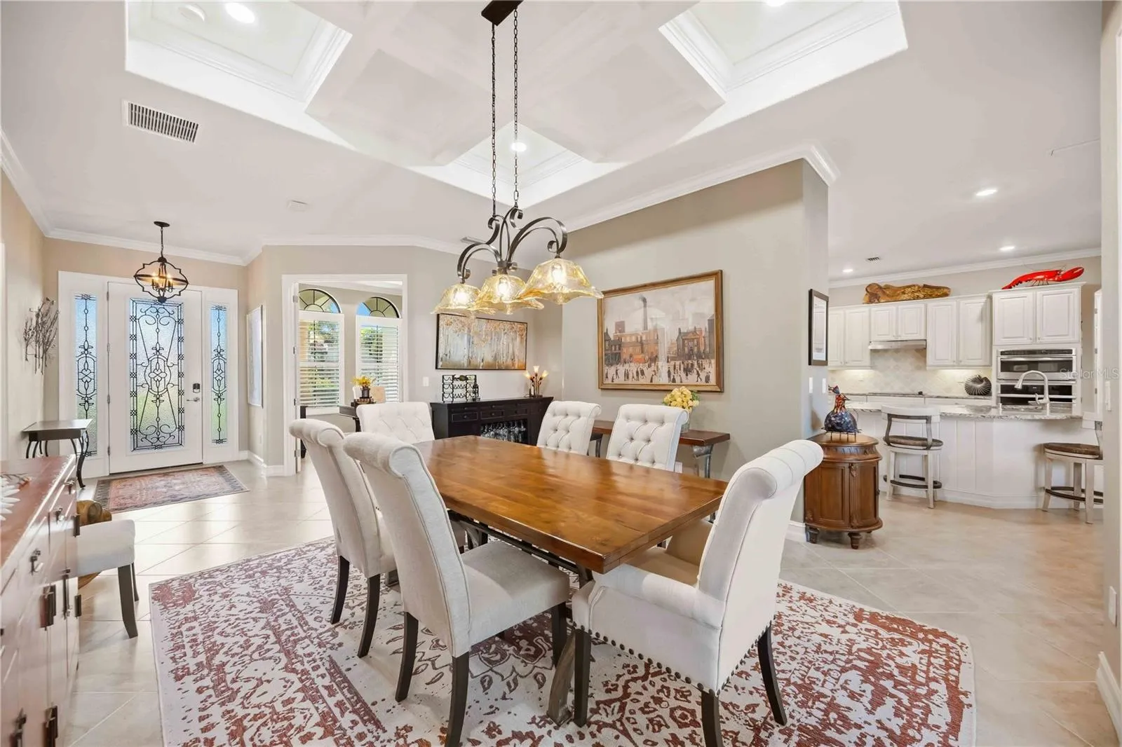 The dining room is the focal point as you enter the home.  the owners took the original dining room and made it an office.  The living room became the dining room and they removed the wall to open the home.  Simply stunning.